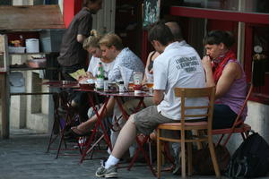 Belgium, Brussels, cafe, day, eye level view, group, man, overcast, people, sitting, street, summer