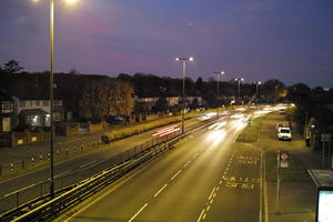 artificial lighting, car, car lights, city lights, elevated, England, evening, lamppost, London, night, outdoor lighting, road, The United Kingdom, traffic, urban, winter