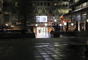 artificial lighting, clock, England, eye level view, London, night, pavement, square, The United Kingdom