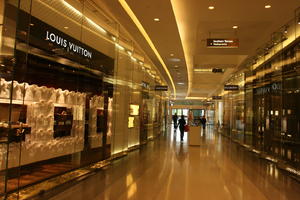 artificial lighting, ceiling, England, eye level view, floor, indoor lighting, interior, London, mall, retail, shop, shopping centre, sign, The United Kingdom