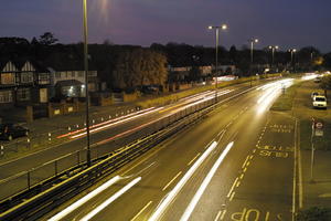 artificial lighting, car, car lights, city lights, elevated, England, evening, lamppost, London, night, outdoor lighting, road, The United Kingdom, traffic, urban, winter