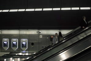 artificial lighting, England, escalator, eye level view, London, night, station, The United Kingdom