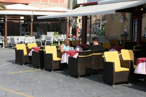 autumn, cafe, casual, Chania, couple, day, eye level view, furniture, Greece, Iraklion (Crete), people, sitting, sunny