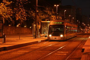 artificial lighting, evening, eye level view, night, Porto, Porto, Portugal, spring, street, tram, tramlines