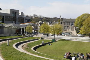 afternoon, day, Edinburgh, elevated, grass, group, natural light, park, people, Scotland, sitting, spring, The United Kingdom, tree