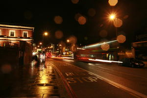 artificial lighting, bus, effect, England, eye level view, London, night, street, The United Kingdom, transport