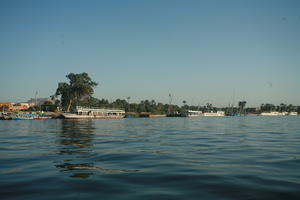 boat, clear, dusk, East Timor, Egypt, Egypt, eye level view, river, river Nile, sky, sun, sunset, tree