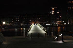 artificial lighting, bridge, building, canal, city, city, city lights, cityscape, England, eye level view, London, night, pavement, pavement, paving, The United Kingdom, winter