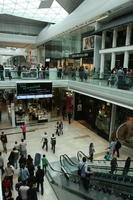 day, elevated, England, escalator, group, indoor lighting, interior, London, mall, natural light, people, retail, shop, shopping, shopping centre, The United Kingdom, walking