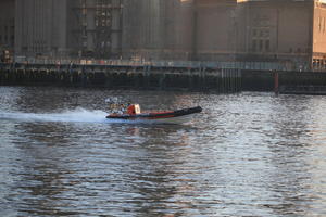 boat, building, dusk, England, eye level view, industrial, London, river, The United Kingdom, transport, winter