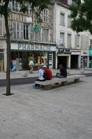 bench, Champagne-Ardenne, city, day, eye level view, France, object, pavement, people, sitting, square, summer, Troyes