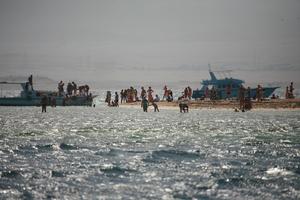 bathing, beach, day, East Timor, Egypt, Egypt, eye level view, natural light, people, seascape, sunbathing, sunny, yacht