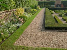 afternoon, day, England, eye level view, flower, garden, grass, hedge, natural light, park, path, plant, summer, sunny, The United Kingdom