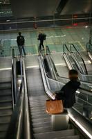 airport, artificial lighting, autumn, Barajas Airport, escalator, evening, eye level view, group, indoor lighting, interior, Madrid, people, Spain