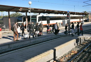 Calpe, casual, crowd, day, eye level view, people, platform, railway, Spain, station, sunny, train, Valenciana, walking