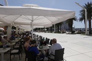 cafe, casual, Croatia, day, eye level view, furniture, parasol, pavement, people, plaza, sitting, Split, Splitsko-Dalmatinska, square, summer, summer, sunny