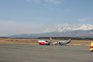 airplane, airport, day, eye level view, mountain, Poprad, Presovsky, Slovakia, transport, van