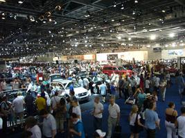 artificial lighting, casual, ceiling, crowd, elevated, England, exhibition, interior, London, people, The United Kingdom