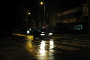 artificial lighting, car lights, city, Croatia, eye level view, night, spring, street, street light, wet, Zadar, Zadarska