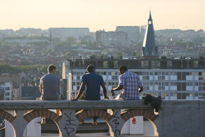 Belgium, Brussels, cityscape, dusk, eye level view, group, man, people, sitting, summer