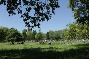 day, England, eye level view, grass, greenery, group, London, park, people, sitting, spring, sunny, The United Kingdom, walking