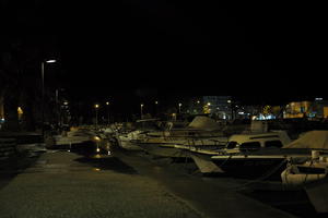 artificial lighting, boat, city, Croatia, embankment, eye level view, night, spring, urban, walkway, wet, Zadar, Zadarska