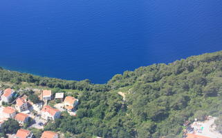 above, aerial view, bright, day, greenery, island, looking down, summer, sunny, village