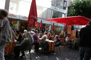 autumn, Bielefeld, bright, cafe, casual, chair, day, Deutschland, eye level view, furniture, Nordrhein-Westfalen, people, shady, sitting, sunny, umbrella