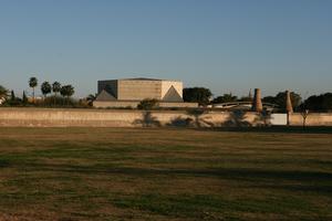 Andalucia, architecture, building, chimney, day, eye level view, field, grass, Sevilla , Spain, tree, vegetation, wall