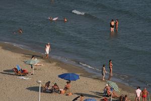 afternoon, bathing, beach, day, direct sunlight, elevated, Grosseto, Italia , natural light, people, summer, sunbathing, Toscana