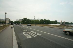 car, eye level view, France, Ile-De-France, overcast, Paris, pavement, road, sign, spring, transport