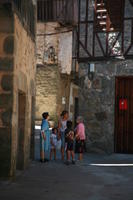 Castilla y Leon, child, day, eye level view, group, house, people, Salamanca, Spain, standing, street, summer, sunlight, sunny, sunshine