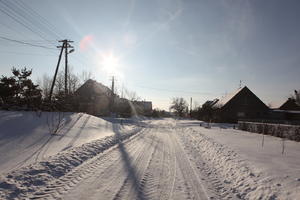 afternoon, bright, day, eye level view, Poland, road, snow, sunny, Wielkopolskie, winter