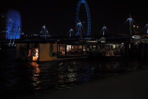 artificial lighting, city, city, city lights, cityscape, England, eye level view, ferris wheel, London, London eye, night, restaurant, river, riverbank, spring, The United Kingdom, urban